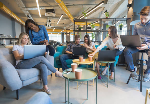 Young people making strategy for startup business in casual co working space